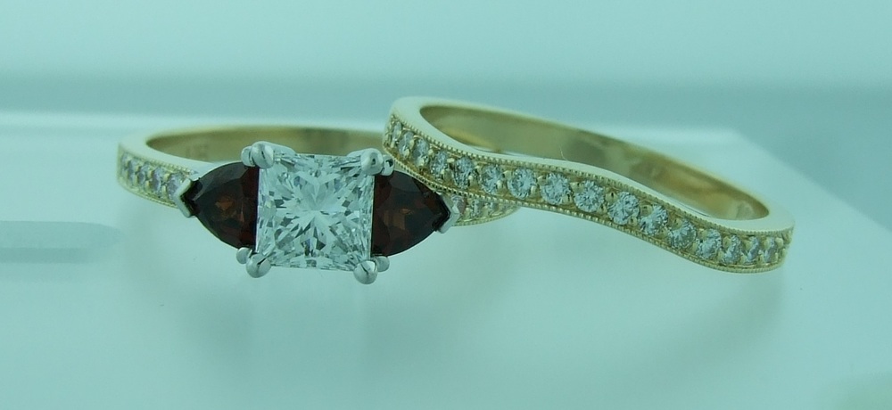 Princess with Trillion Garnets and Curved Band