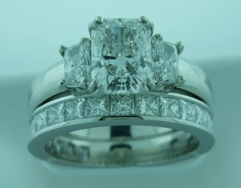 Radiant Trapezoid Three-Stone with Wedding Band