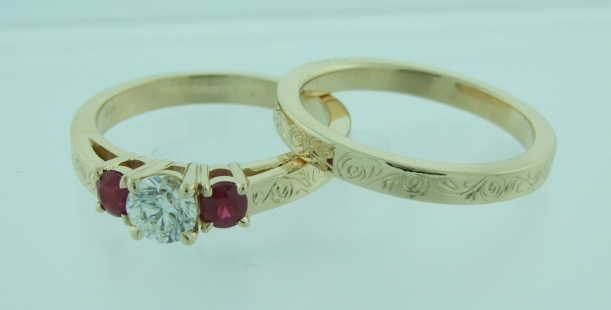 Round Three-Stone with Rubies in Yellow Gold