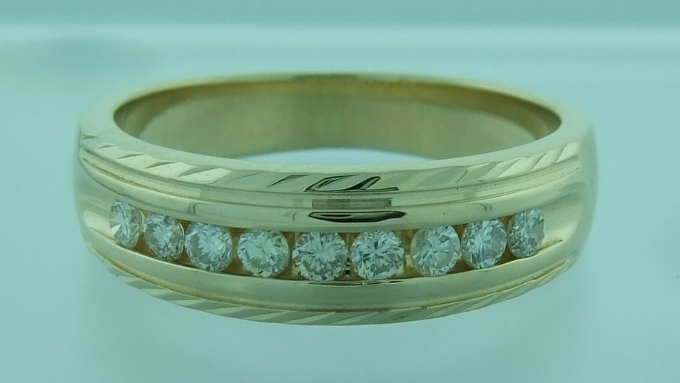 Yellow Gold Nine-Diamond Channel Band