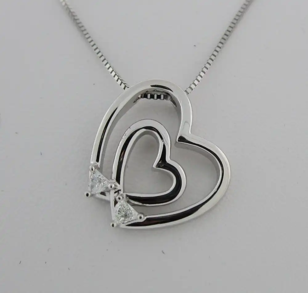 Double Heart Pendant with Two Trillion Diamonds